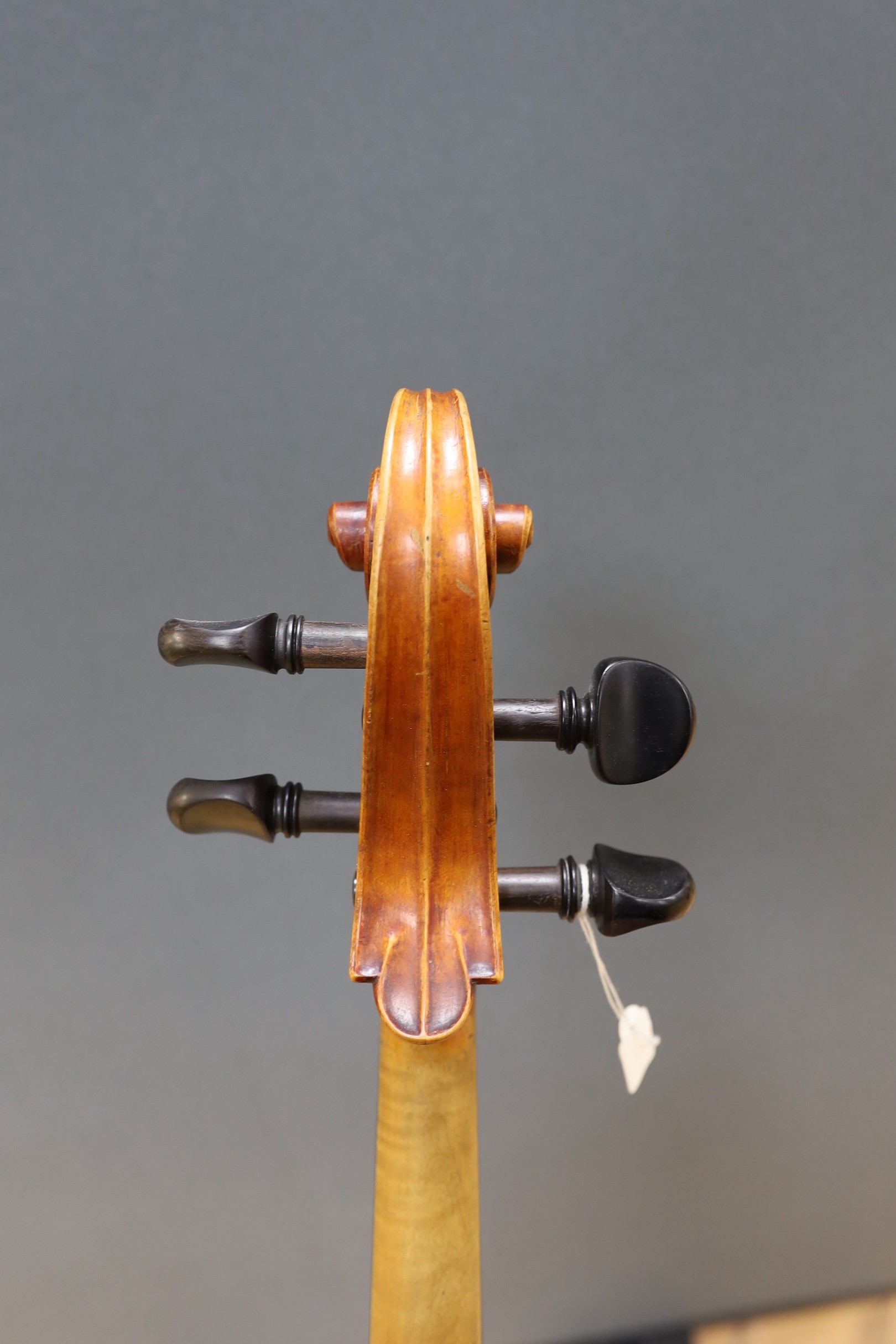An early 20th century French half size cello, with soft case and bow